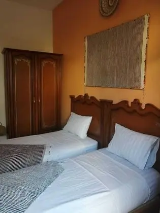 Üç Kişilik Oda