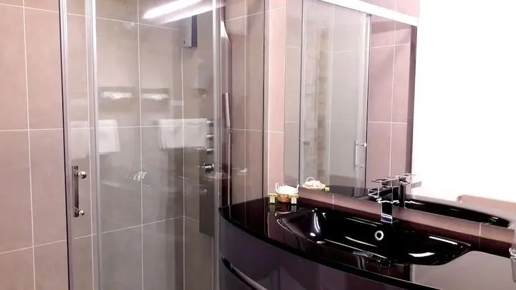 Tek Büyük veya İki Ayrı Yataklı Oda, Bahçe Manzaralı