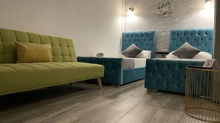 Deluxe Üç Kişilik Oda, Birden Çok Yatak