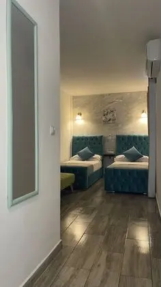 Deluxe Üç Kişilik Oda, Birden Çok Yatak