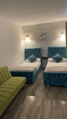 Deluxe Üç Kişilik Oda, Birden Çok Yatak