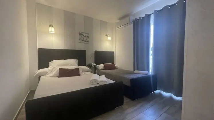 Deluxe Üç Kişilik Oda, Birden Çok Yatak