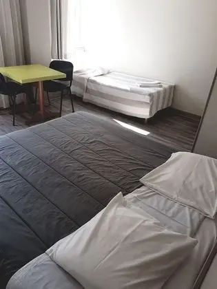 Üç Kişilik Oda