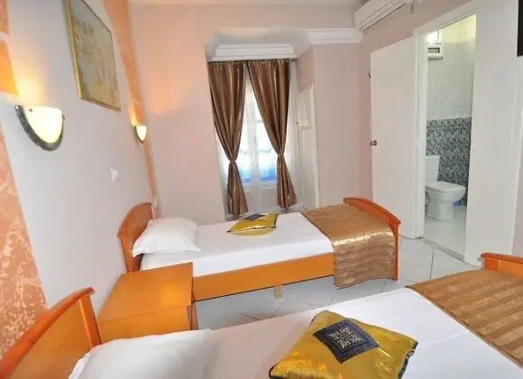 Üç Kişilik Oda