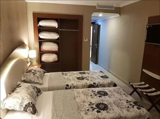 Üç Kişilik Oda
