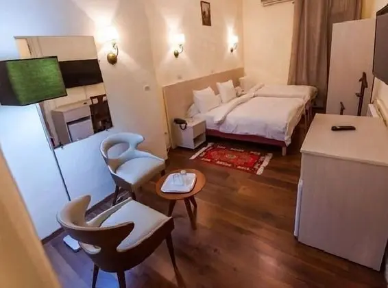 Deluxe Tek Büyük veya İki Ayrı Yataklı Oda