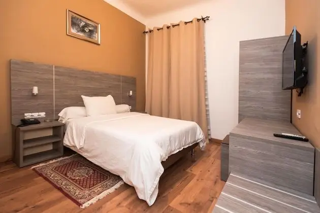 Deluxe Tek Büyük veya İki Ayrı Yataklı Oda