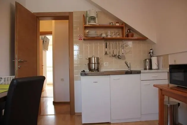 Apartment with kitchen and balcony