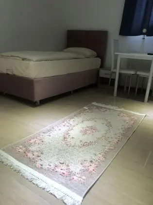 Üç Kişilik Oda