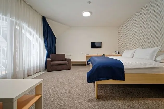 Deluxe Tek Büyük veya İki Ayrı Yataklı Oda