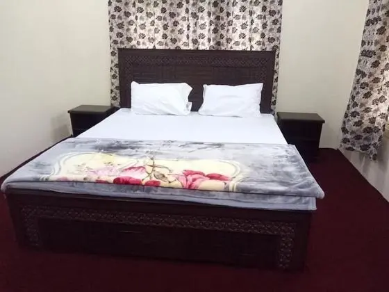 Deluxe Tek Büyük veya İki Ayrı Yataklı Oda