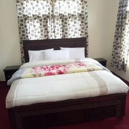 Deluxe Tek Büyük veya İki Ayrı Yataklı Oda