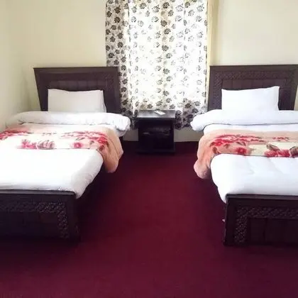 Deluxe Tek Büyük veya İki Ayrı Yataklı Oda