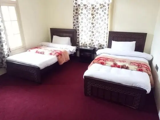 Deluxe Tek Büyük veya İki Ayrı Yataklı Oda
