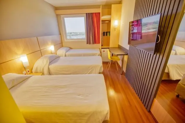 Apartamento Triplo Solteiro