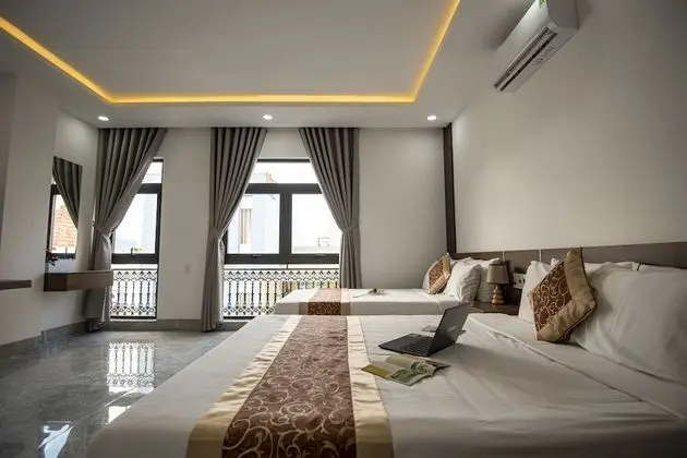Deluxe Üç Kişilik Oda