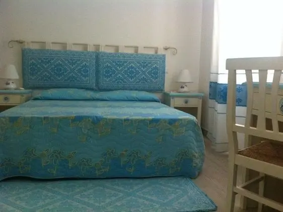 Tek Büyük veya İki Ayrı Yataklı Oda, Bahçe Manzaralı