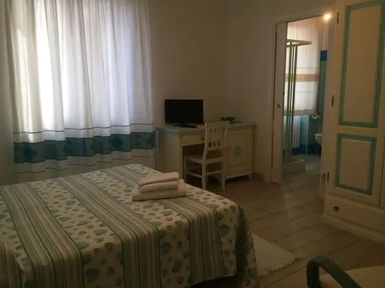 Tek Büyük veya İki Ayrı Yataklı Oda, Bahçe Manzaralı