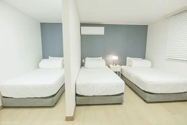 Deluxe Triple (Hotel Room)