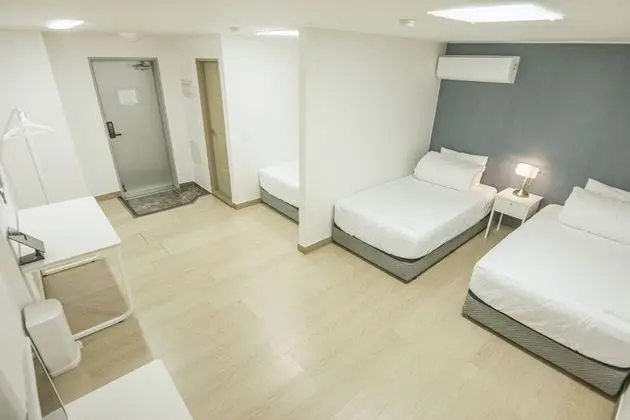 Deluxe Triple (Hotel Room)