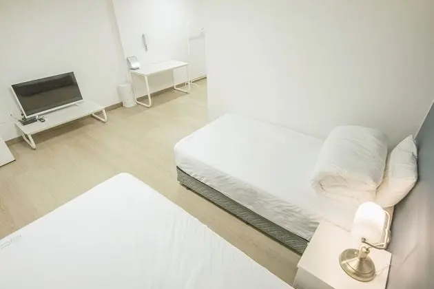 Deluxe Triple (Hotel Room)