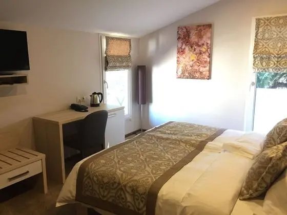 Deluxe Tek Büyük veya İki Ayrı Yataklı Oda
