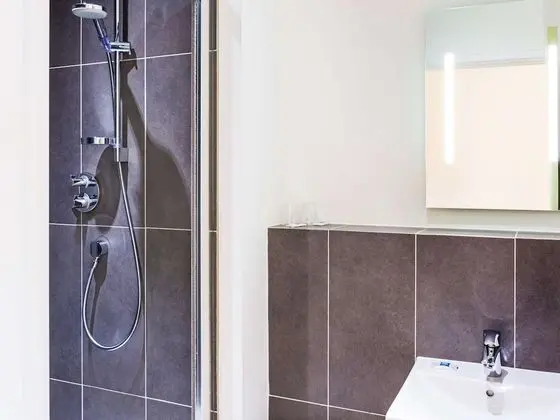 Üç Kişilik Oda (with a large bed and a bunk bed)