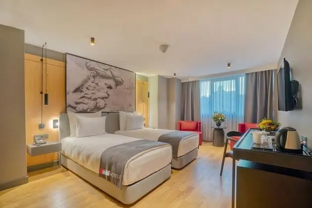 Deluxe Tek Büyük veya İki Ayrı Yataklı Oda