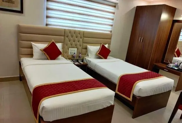 Deluxe Tek Büyük veya İki Ayrı Yataklı Oda