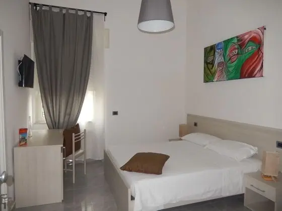 Tek Büyük veya İki Ayrı Yataklı Oda, Bahçe Manzaralı