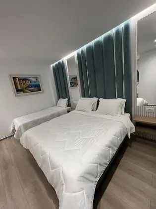 Üç Kişilik Oda