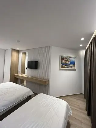 Üç Kişilik Oda