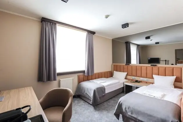 Classic Tek Büyük veya İki Ayrı Yataklı Oda