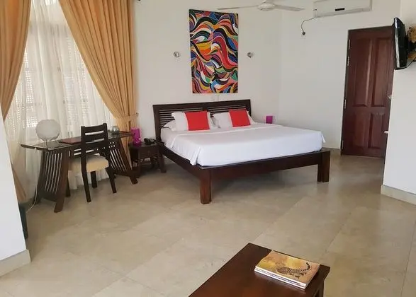 Deluxe Tek Büyük veya İki Ayrı Yataklı Oda