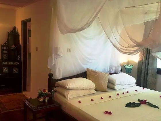 Deluxe Tek Büyük veya İki Ayrı Yataklı Oda, 1 Yatak Odası, Sigara İçilebilir, Kısmi Deniz Manzaralı