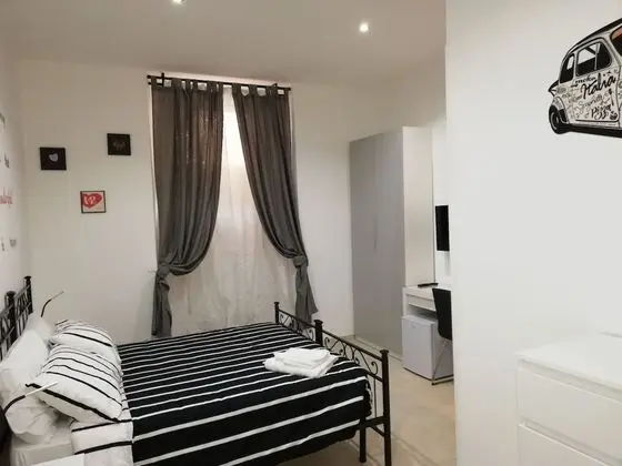 Deluxe Tek Büyük veya İki Ayrı Yataklı Oda (Lucilla)