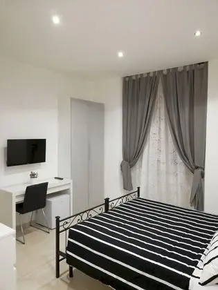 Deluxe Tek Büyük veya İki Ayrı Yataklı Oda (Lucilla)