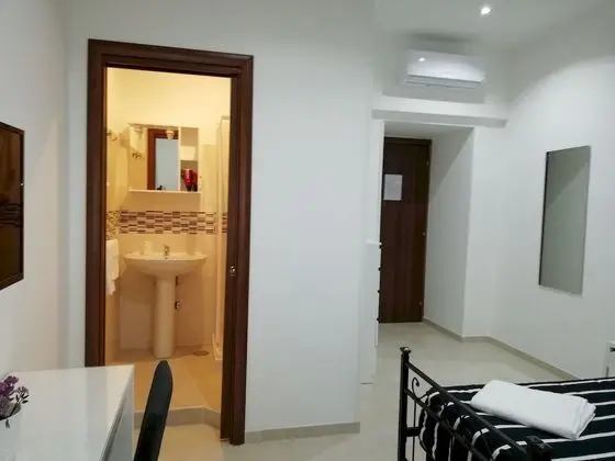 Deluxe Tek Büyük veya İki Ayrı Yataklı Oda (Lucilla)