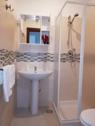 Deluxe Tek Büyük veya İki Ayrı Yataklı Oda (Lucilla)