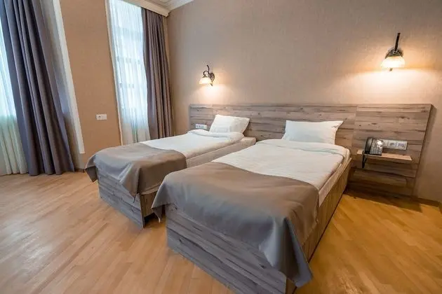 Superior Tek Büyük veya İki Ayrı Yataklı Oda