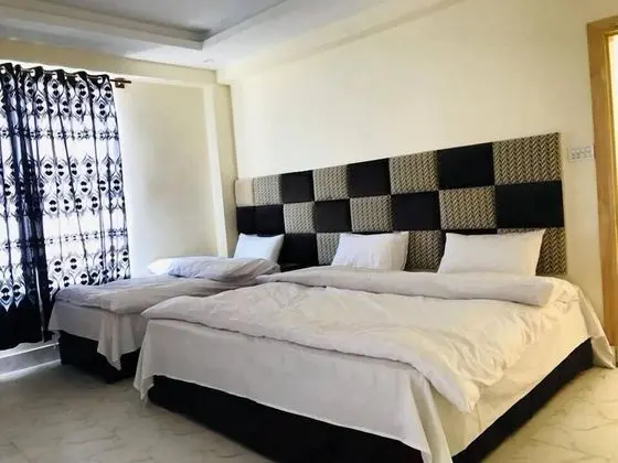Deluxe Üç Kişilik Oda