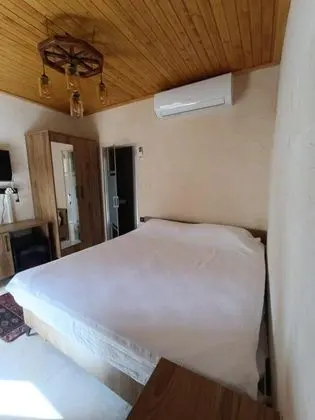 Deluxe Dört Kişilik Oda