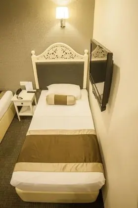 Üç Kişilik Oda