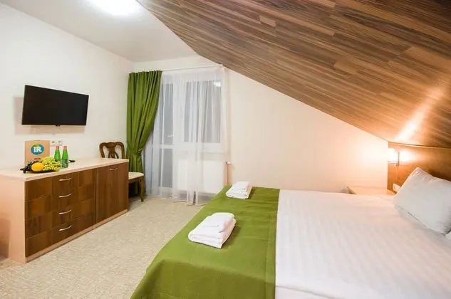 Deluxe Tek Büyük veya İki Ayrı Yataklı Oda