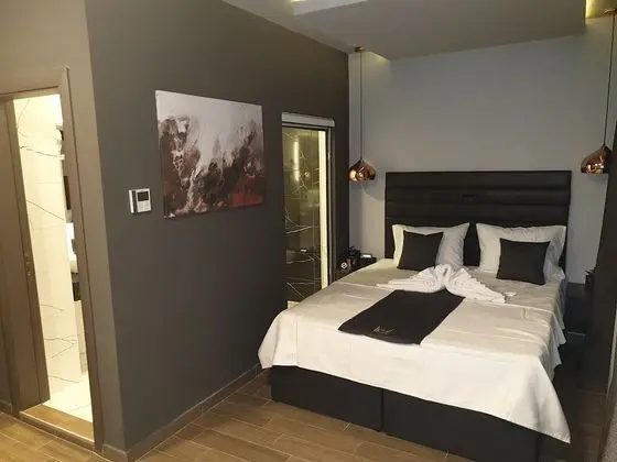 Deluxe Tek Büyük veya İki Ayrı Yataklı Oda