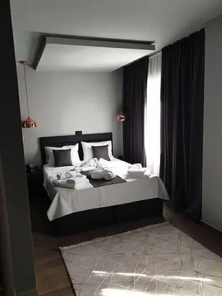 Deluxe Tek Büyük veya İki Ayrı Yataklı Oda