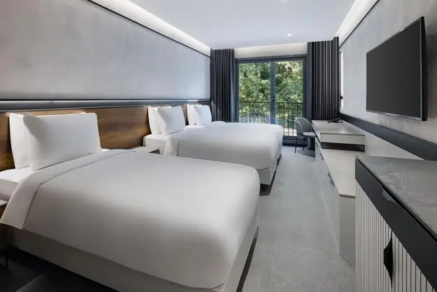 Deluxe Üç Kişilik Oda , Bahçe Manzaralı