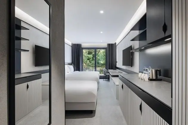 Deluxe Üç Kişilik Oda , Bahçe Manzaralı