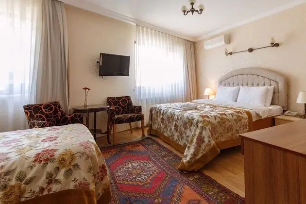 Üç Kişilik Oda