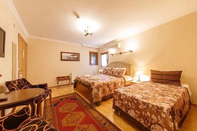 Üç Kişilik Oda